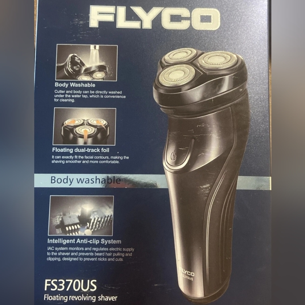 NIB men’s electric razor